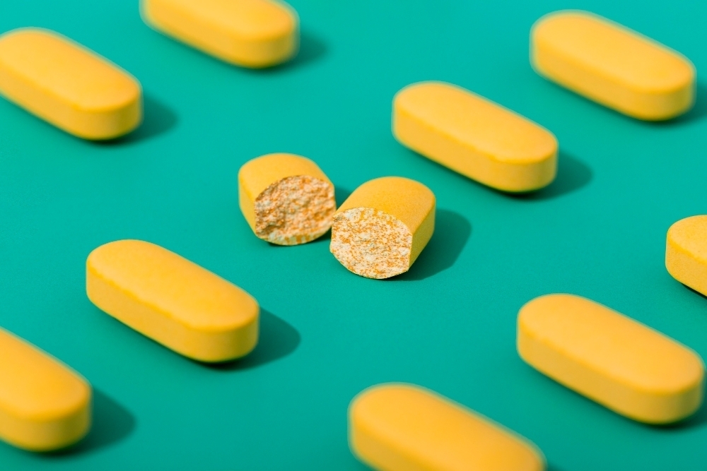 High angle of niacin pills with a broken one